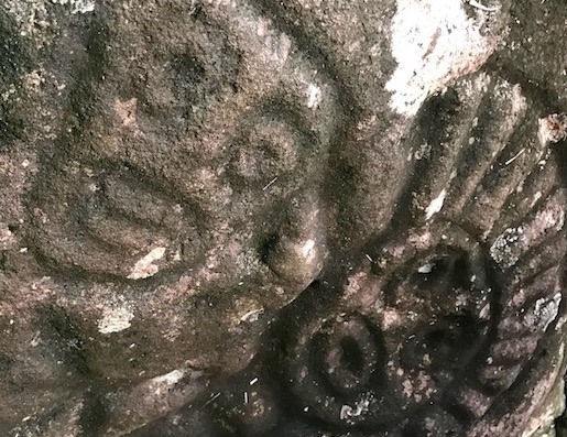 A close up of petroglyphs on the Mt. Rich Carib Stone.